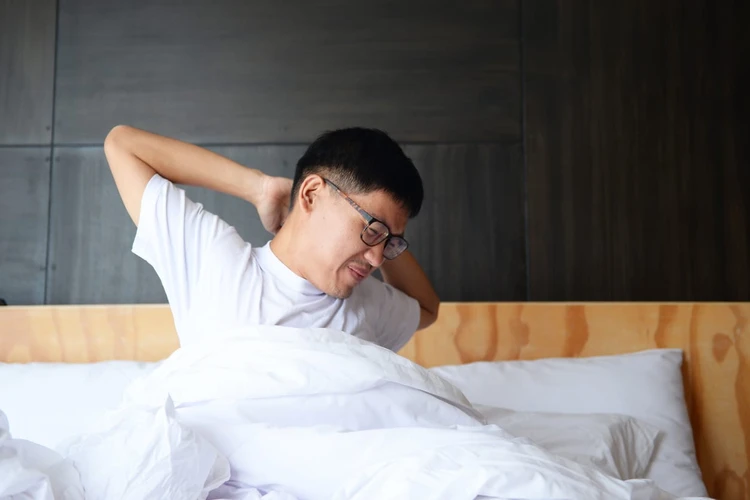 Penyebab Leher Kaku Setelah Bangun Tidur dan Cara Mengatasinya